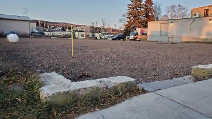 The businesses that once stood on these vacant lots are working with the EDA on a redevelopment plan. Photo by Rhonda Silence