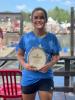 Allie Duclos of Lutsen with the first place, world championship trophy at the Hayward Lumberjack Championship. Submitted photo