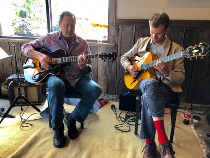 Briand Morrison and Sam Miltich play at Voyageur Brewing. Photo by Jim McGowan.