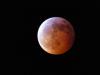 Eclipse over Gunflint Lake.  Photo by John Silliman