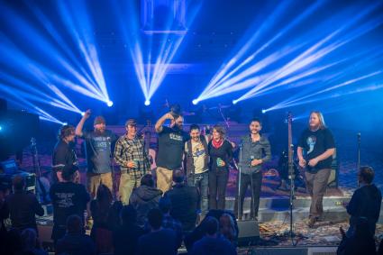 Black River Revue (Adam Stariha, center) celebrate at Sacred Heart Chapel - photo by Lloyd Fischer via Facebook