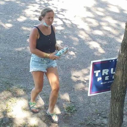 A camera caught a woman vandalising a Trump 2020 sign on County Road 7 in Grand Marais. Submitted photo