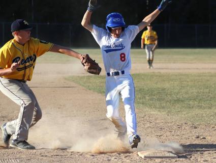 Amos Falter's fancy footwork avoids on out vs Eveleth - Photo by Renee Buryanek