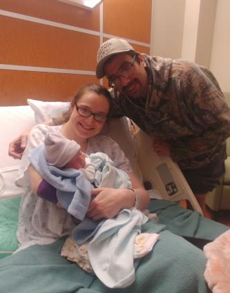 Baby Atticus and his parents, Danielle and Rob safe at North Shore Health - 11-12-19 Photo by Rhonda Silence