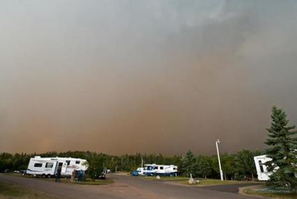 Smoke and a thunderstorm Monday in the Grand Marais Rec Park/ photo Bryan Hansel