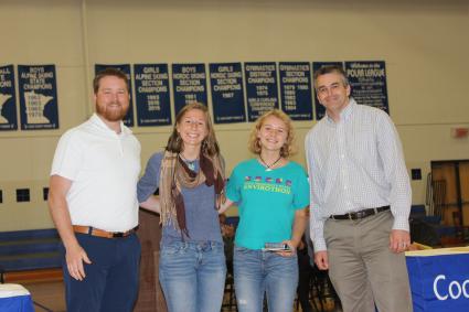 School Counselor Kris Hoffman, Valedictorian Maya McHugh, Salutatorian Linnea Henrikson, Principal Bill DeWitt