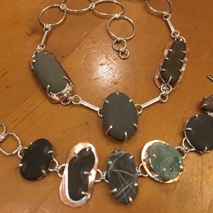 Some of Beth Carter Gautsch's stone jewelry / Photo via North House Folk School