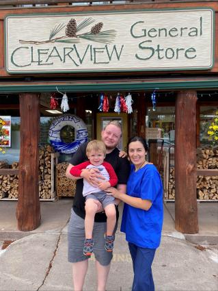 Chris and Flavia Homyak and their son posed for a photo before getting to work at Clearview. Photo courtesy of the family