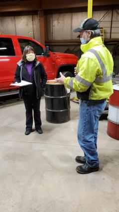 County Commissioner Stacy Hawkins asks Highway Department Mechanic Steve Butz some questions. 04-08-21 Photo by Rhonda Silence