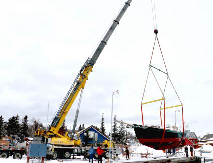 A crane lifts the Hjørdis at North House Folk School in Grand Marais. Submitted photo