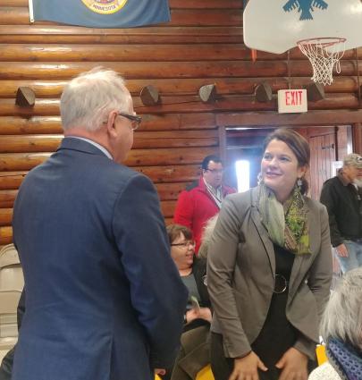 Gov. Tim Walz visits with County Attorney Molly Hicken in this 2018 photo by Rhonda Silence. 