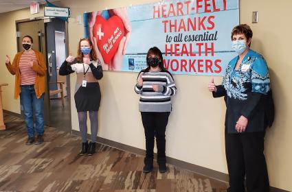 A thumbs up from local health officials - Grace Grinager, Kate Surbaugh, Jenn Sorenson and Kimber Wraastad. Photo Rhonda Silence