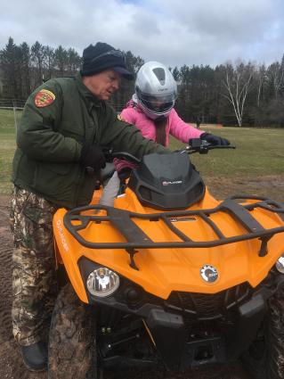 MN DNR Conservation Officer Darin Fagerman goes over the pre-ride safety check. Photo courtesy of ISD 166