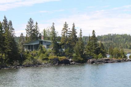 Cottages have been scattered along the rugged Isle Royale shoreline for generations. Photo by Rhonda Silence, June 2017