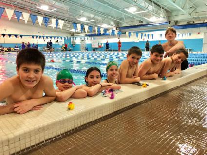 Members of the YMCA Northerns Swim Team. Photo by Sara Taylor