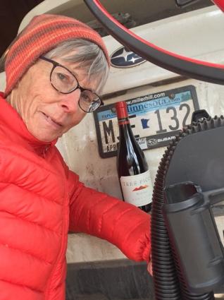 Karen Neal of Grand Marais with the mystery items left in her car. Submitted photo