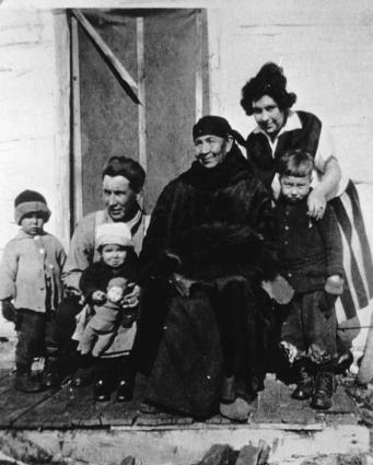 Kate Frost and family on the porch in Chippewa City (Jim Wipson lower right)/photo courtesy of Jim Wipson