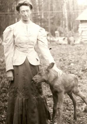 Laura and her pet moose (Cook County Historical Society)