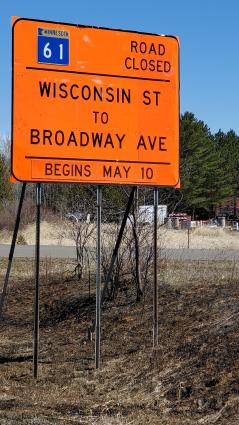 Construction signs in Grand Marais. Although this says road closed May 10, preparation work is beginning now. Photo by R Silence