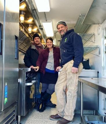 Nathan and Sara Hingos picking up their new food truck. Photo courtesy of Crooked Spoon