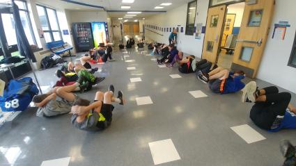 Before running, the North Shore Storm goes through a vigorous warm-up routine