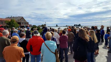 An estimated 150 people attended the rally at Harbor Park. Photo by Ann Possis