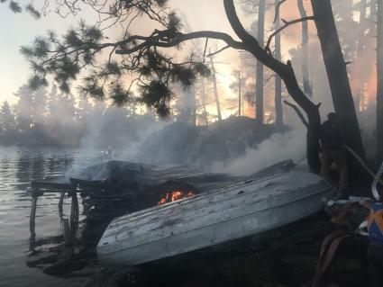 Saganaga cabin fire 08-11-19 - Community members turned out to fight the fire - Photo by Marco Manzo III  