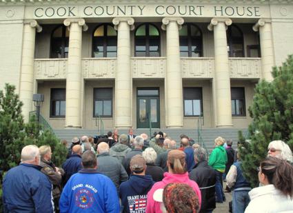 Crowd gathered at Cook County Courthouse to hear Special Prosecutor Thomas Heffelfinger. Photo by Carah Thomas