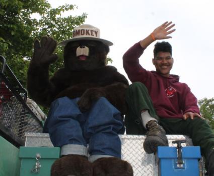 Although fire danger is now moderate, Smokey and friend still ask the public to be careful with fire.  File photo Rhonda Silence