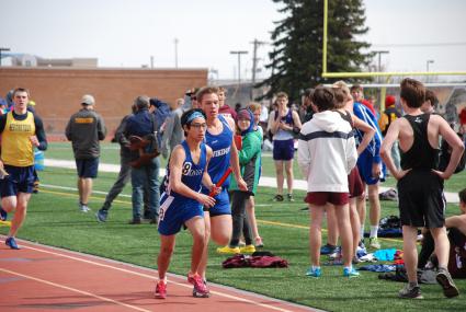 Trent Spry handing off to JRon Tamanaha at a recent Track meet