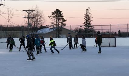 Try Hockey Day started under bright blue skies and skaters practiced through sunset on Feb. 19 - Photo Renee Buryanek