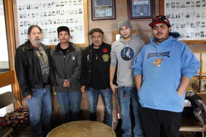 Grand Portage Post 2009 Commander Orlando Swader (center) with the Stonebridge Singers. Photo by Rhonda Silence