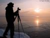 Winter sunrise on Wauswaugoning Bay by Travis Novitsky