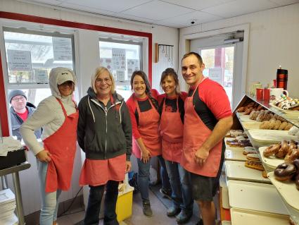 The World's Best Donuts crew wrapping up the season in the cold weather, Oct. 22, 2021 - Photo by Rhonda Silence