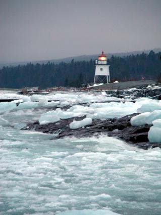 Grand Marais Lighthouse and Lake Superior Ice by David Grinstead