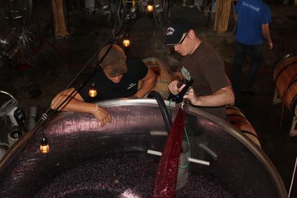 Wine is 'turned over' at North Shore Winery. All photos by Joe Friedrichs