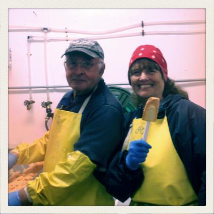 Joan and Bob Burrows clean herring roe at the Dockside Fish Market in Grand Marais / photo by Barbara Jean Johnson