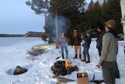 Photo taken from Echoes from Iron Ore recording sessions. Producer Dave Simonett center.