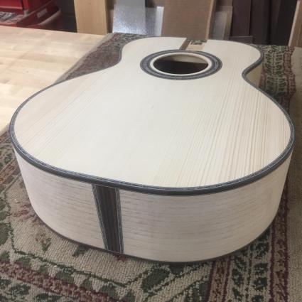 Special guitar with paulownia and Gunflint Trail blowdown wood - Photo by Drew Heinonen